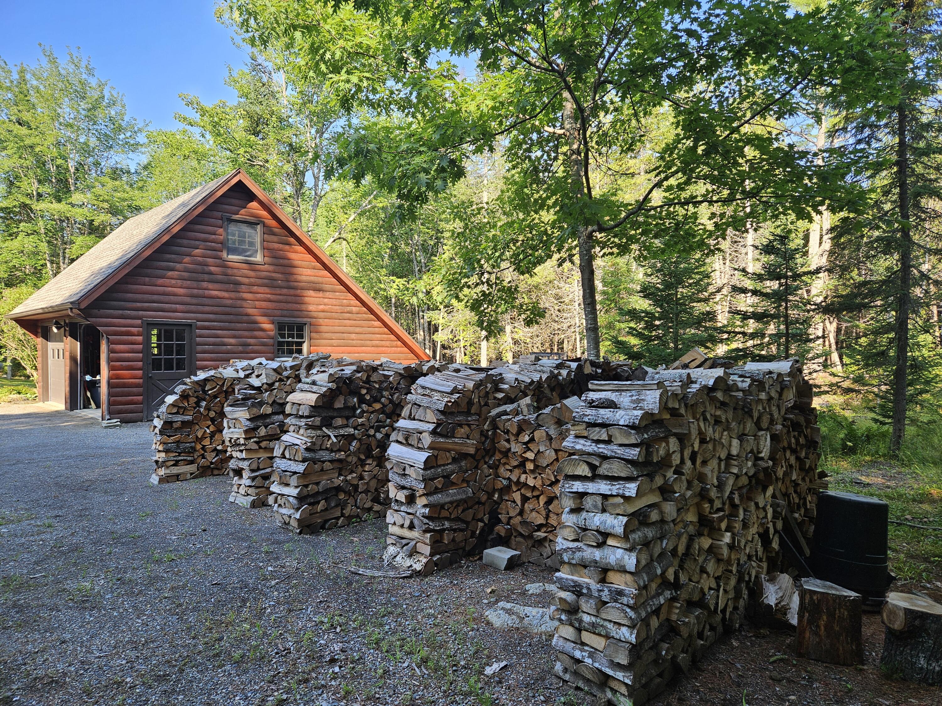 901 Mann Hill Road Holden, ME 04429 - Photo 37 of 54 34 Wood Stacked to Owners Satisfaction