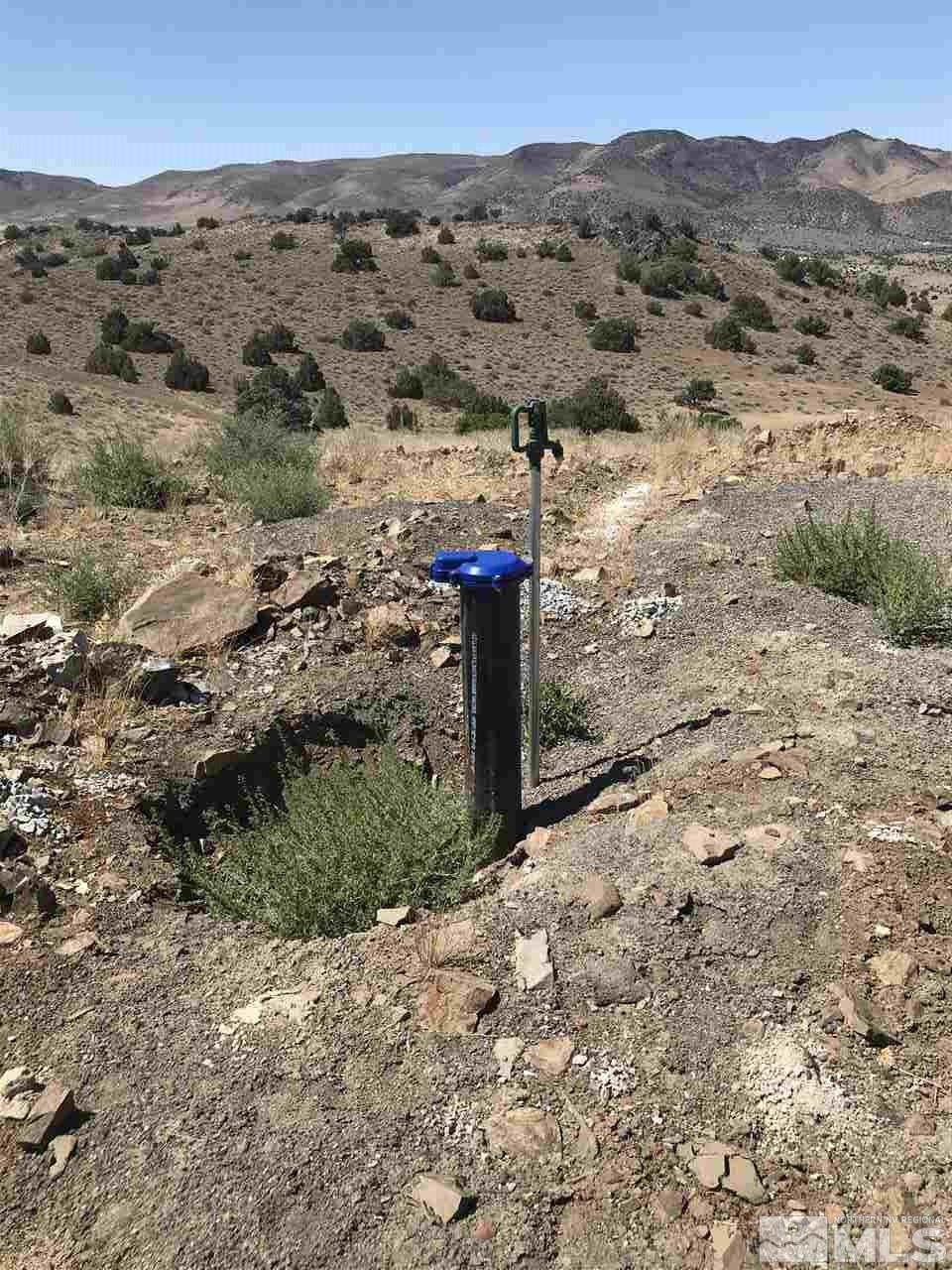 2835 O Hara Reno, NV 89510 - Photo 1 of 6 a view of a dry field with mountains in the background
