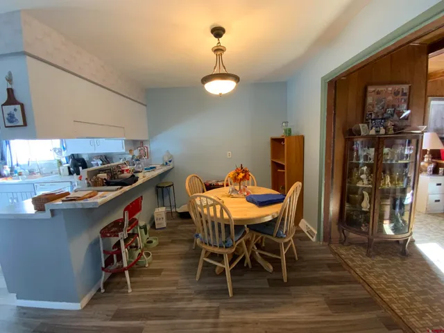 a view of a dining room with furniture