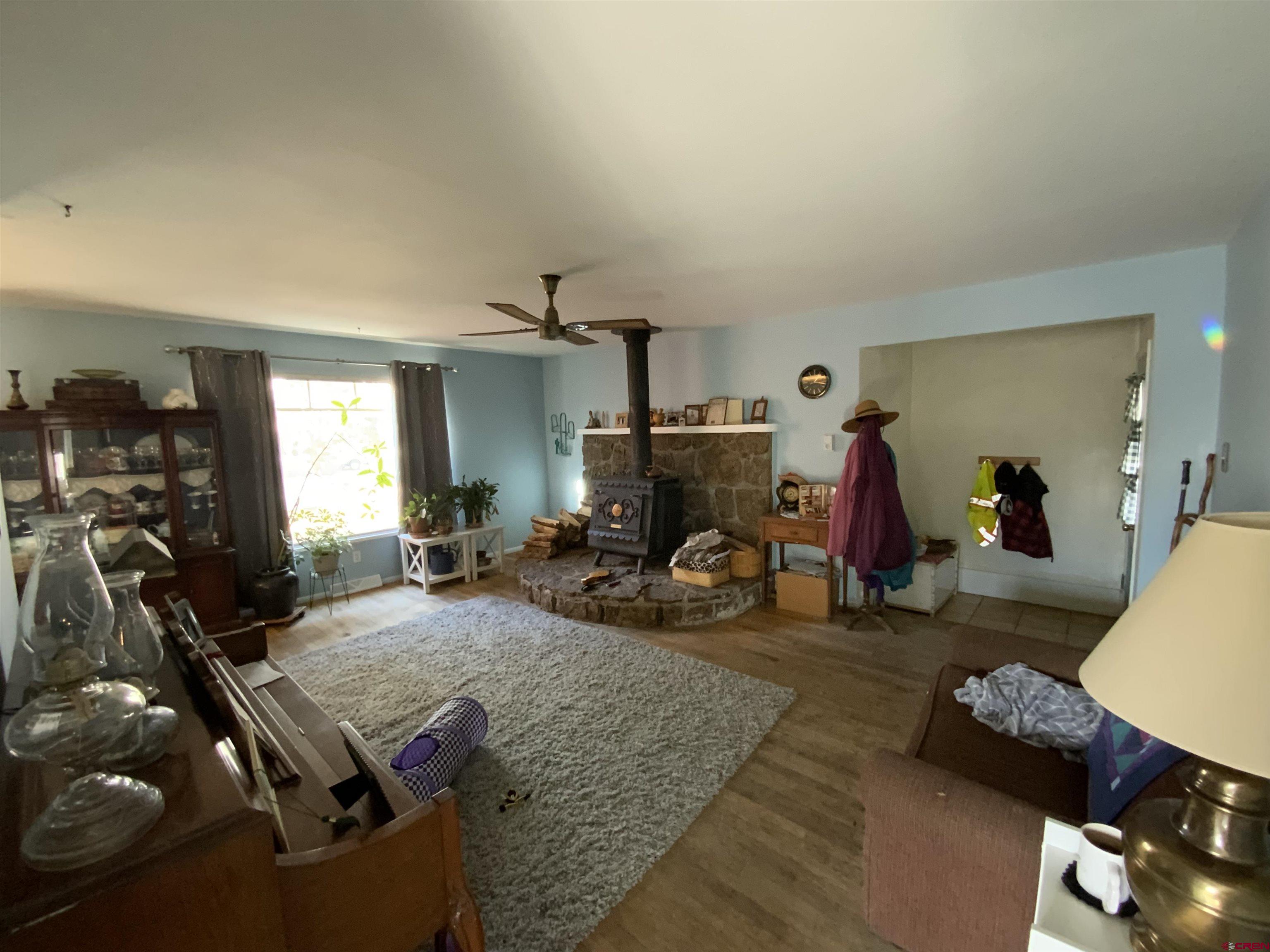 21 Vulcan Street Gunnison, CO 81230 - Photo 19 of 21 a room with furniture gym equipment and view of living room