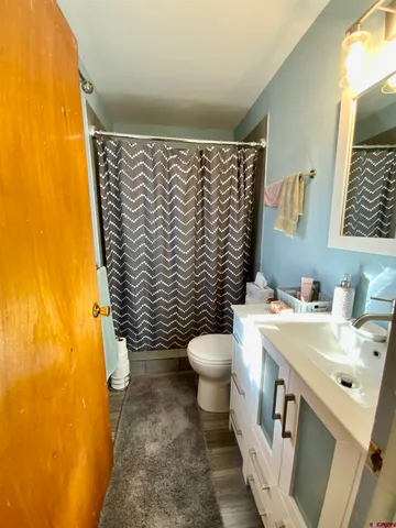 a bathroom with a sink and a toilet