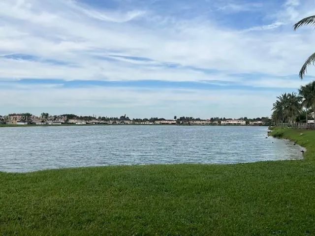 a view of a lake from a yard