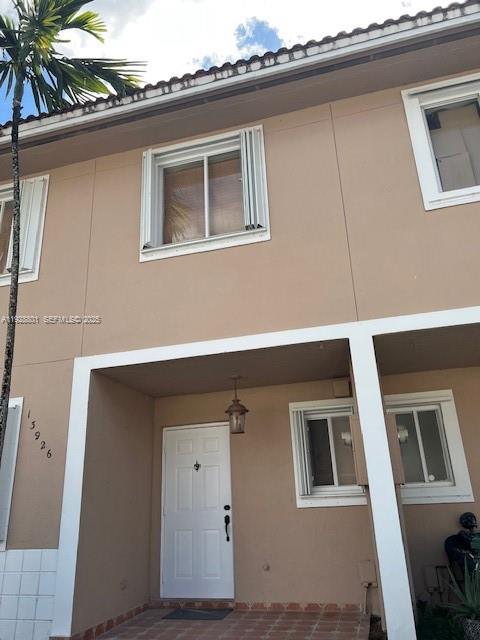 13926 Southwest 175th Terrace Miami, FL 33177 - Photo 2 of 19 a view of house with a street