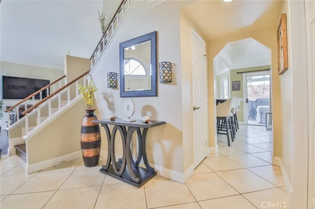 a view of entryway and hall with a front door