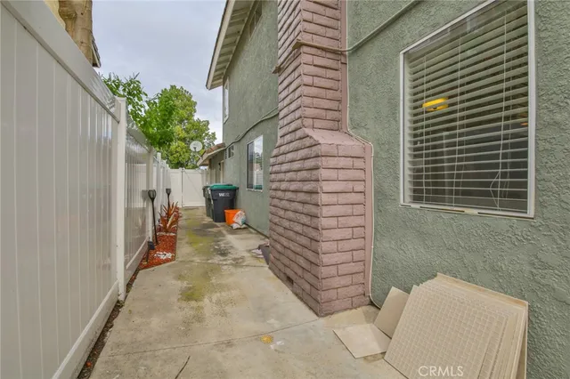 a view of swimming pool with a patio