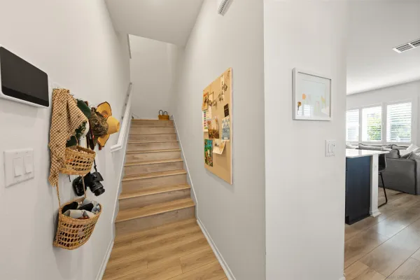 a dining hall with lots of tables and chairs