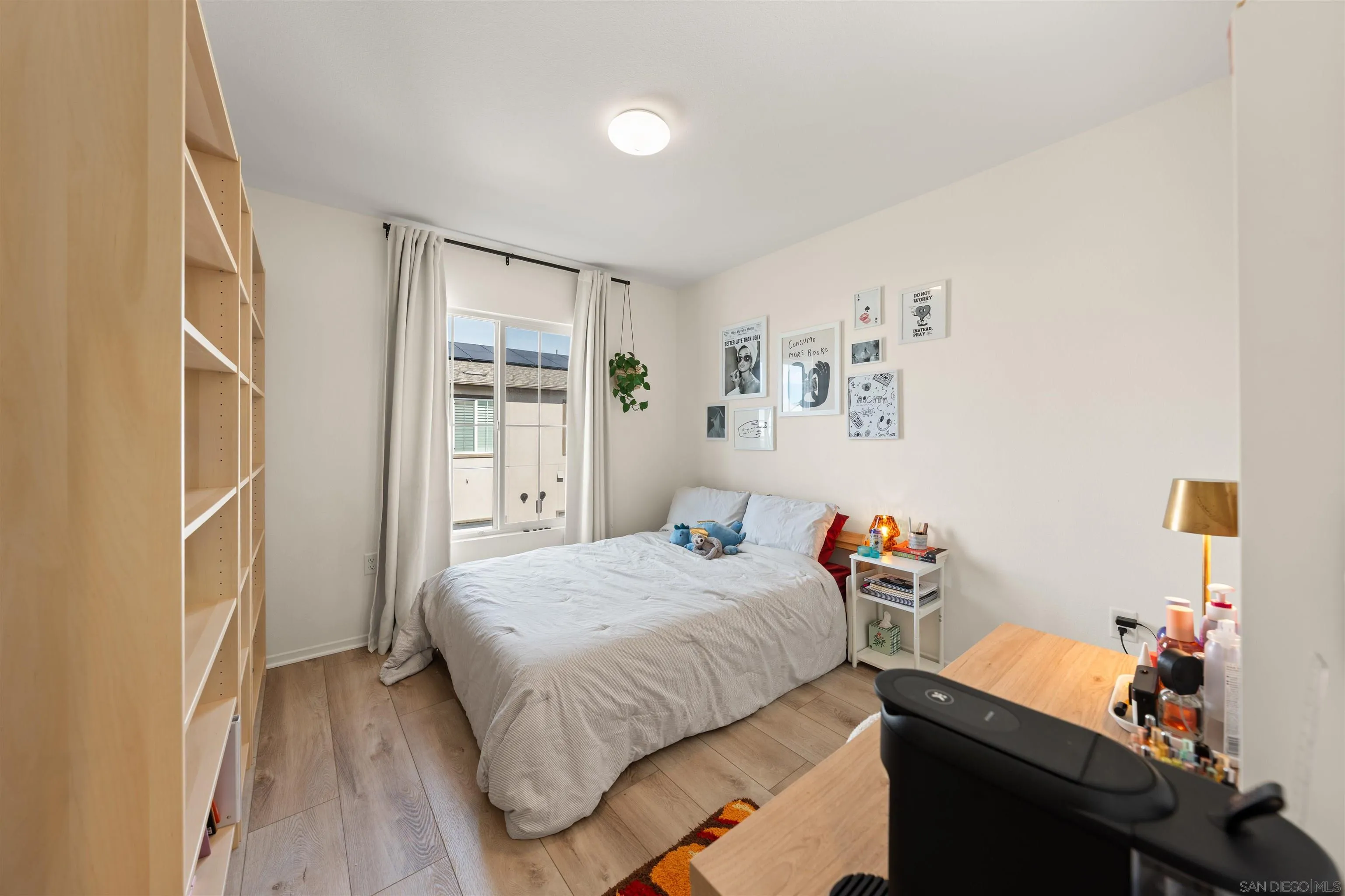 303 Citrine Trail Fallbrook, CA 92028 - Photo 25 of 47 a bedroom with a bed and a window