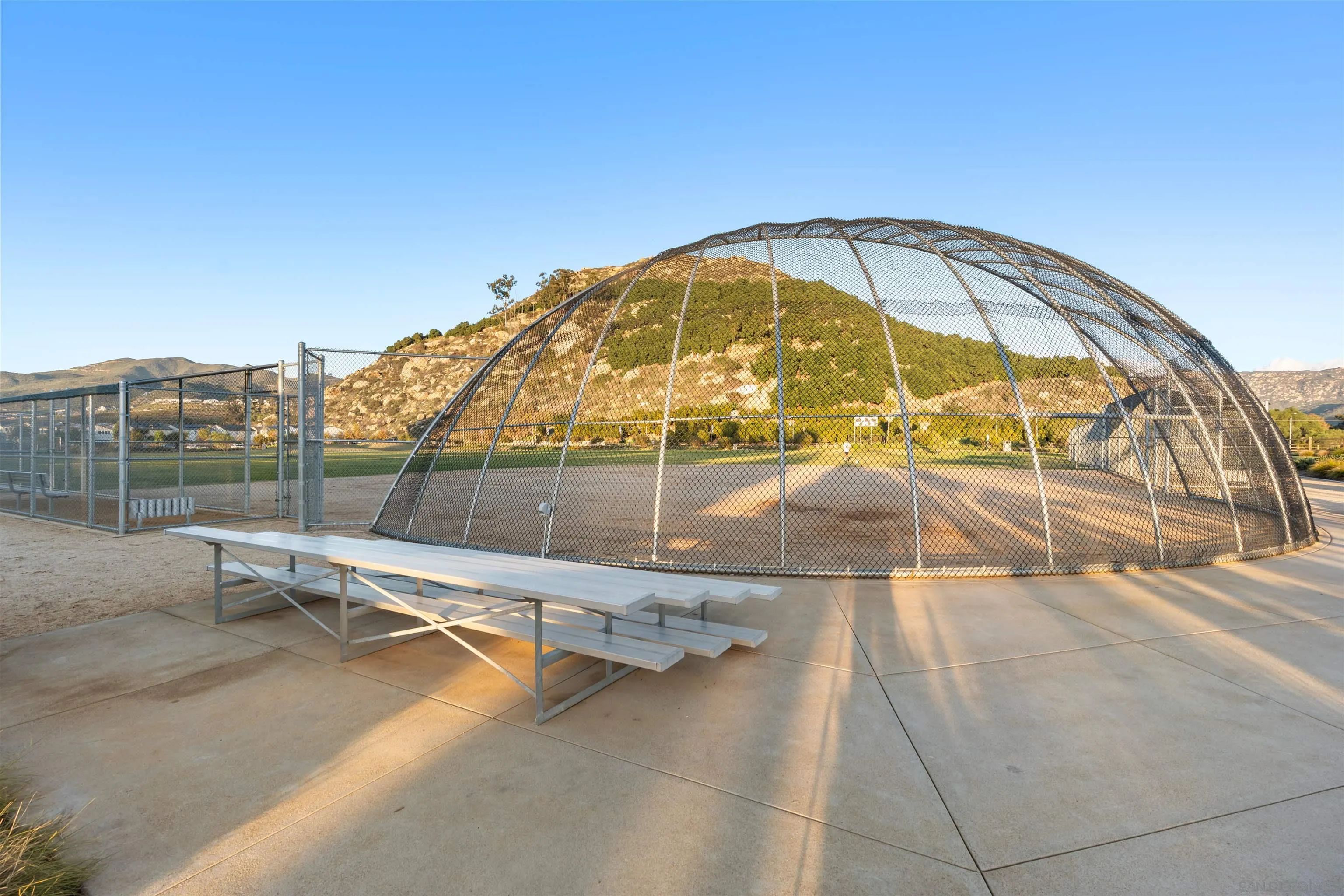 303 Citrine Trail Fallbrook, CA 92028 - Photo 42 of 47 a view of a swimming pool with a lounge chair