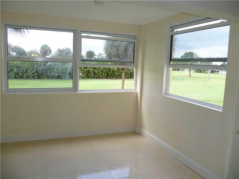 9233 Southwest 8th Street, Unit 222 Boca Raton, FL 33428 - Photo 4 of 16 Extended living room