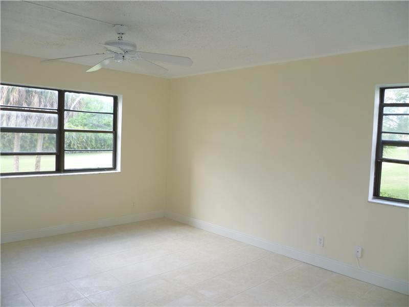 9233 Southwest 8th Street, Unit 222 Boca Raton, FL 33428 - Photo 5 of 16 Master bedroom