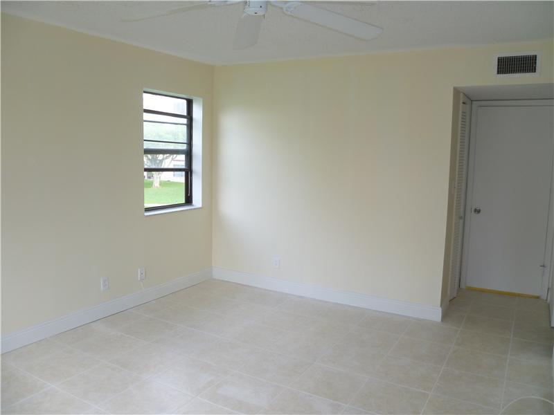 9233 Southwest 8th Street, Unit 222 Boca Raton, FL 33428 - Photo 6 of 16 Master bedroom
