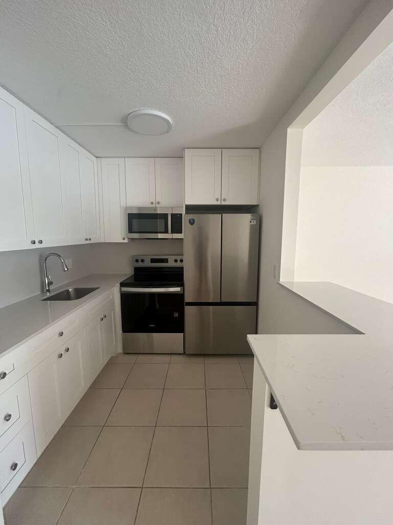230 Fanshaw F, Unit F230 Boca Raton, FL 33434 - Photo 3 of 22 kitchen