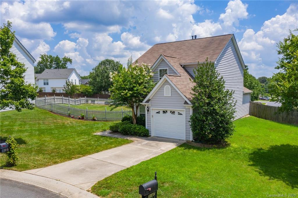 3143 Tanzanite Circle Fort Mill, SC 29708 - Photo 2 of 33 a front view of a house with garden