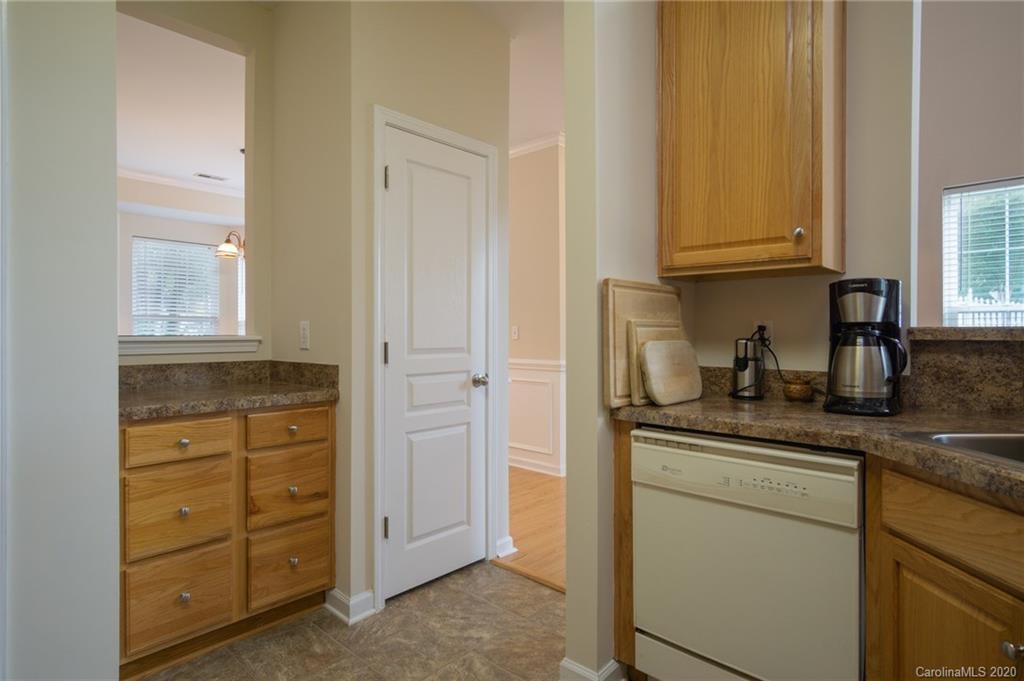 3143 Tanzanite Circle Fort Mill, SC 29708 - Photo 11 of 33 a kitchen with granite countertop cabinets and sink