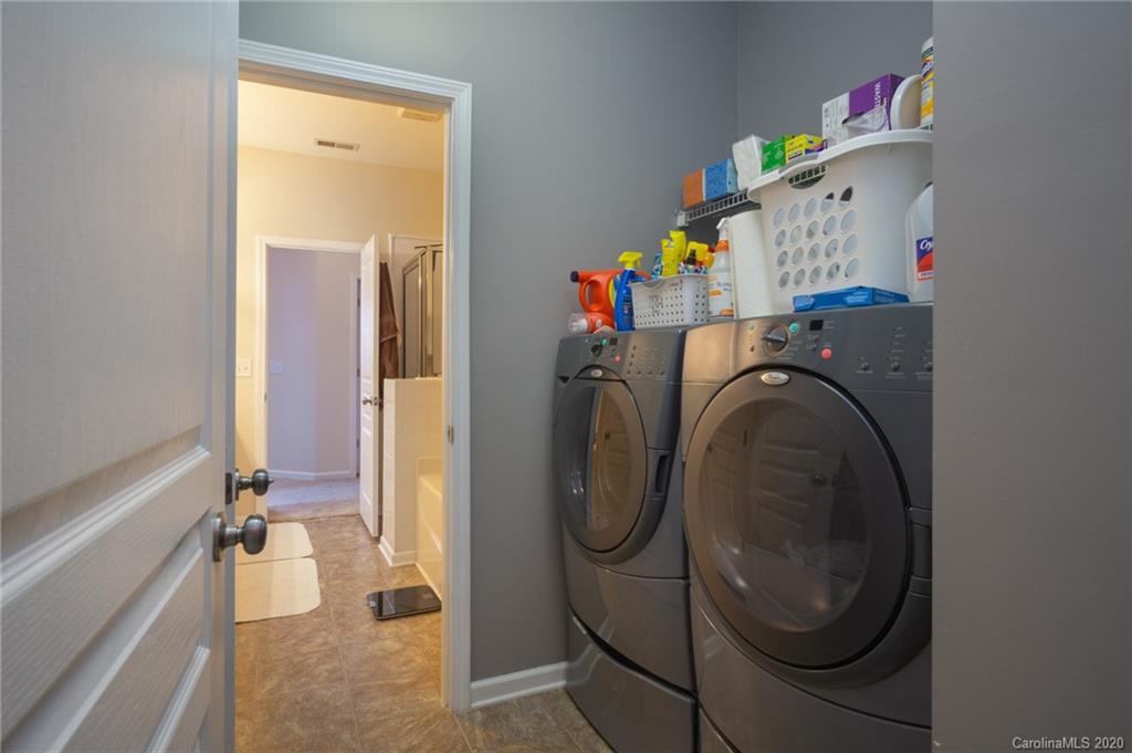 3143 Tanzanite Circle Fort Mill, SC 29708 - Photo 13 of 33 a utility room with dryer and washer