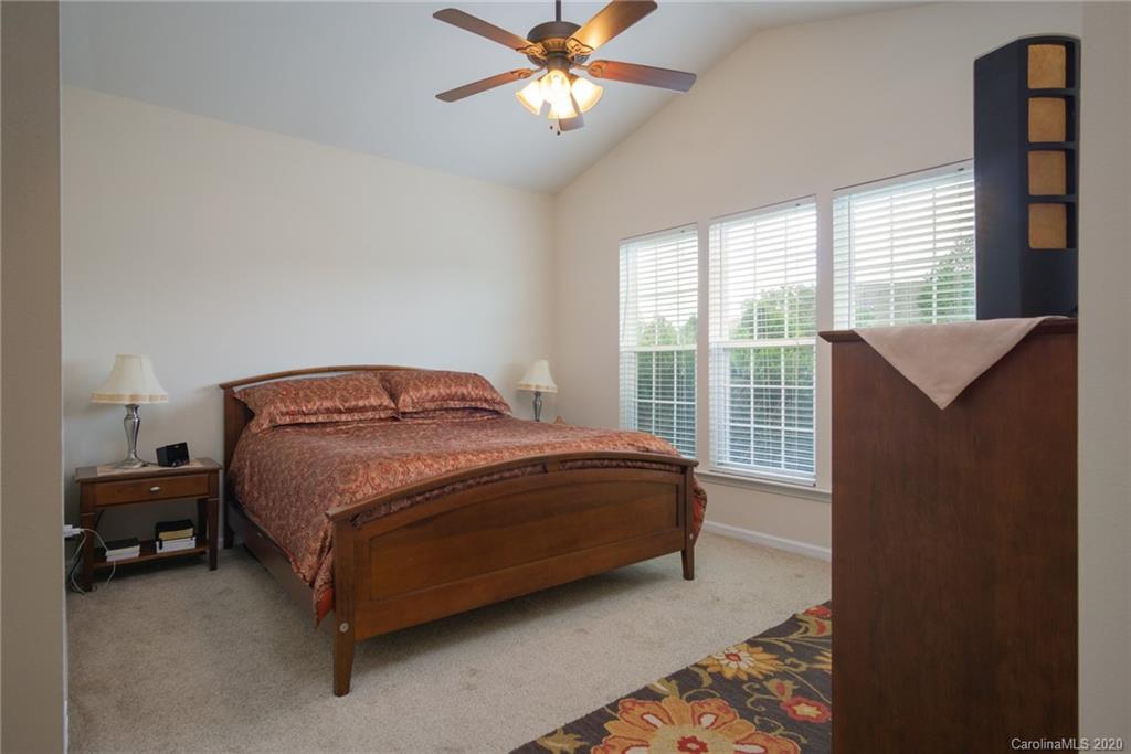 3143 Tanzanite Circle Fort Mill, SC 29708 - Photo 14 of 33 a bedroom with a bed and a window