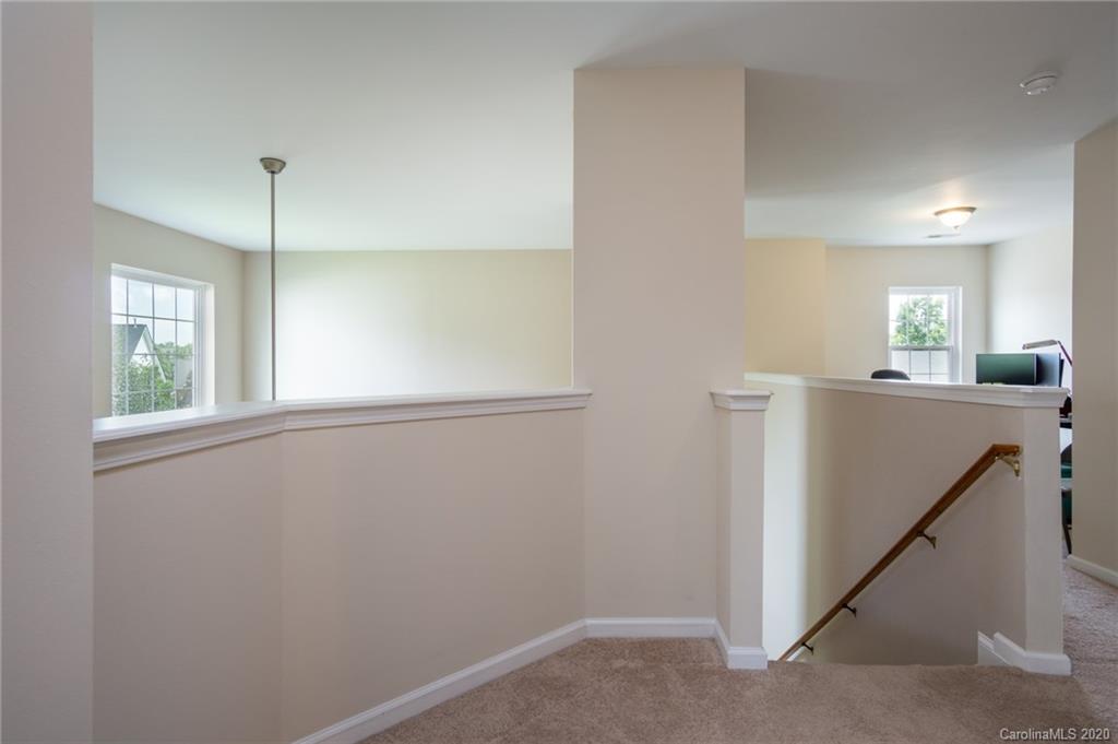 3143 Tanzanite Circle Fort Mill, SC 29708 - Photo 18 of 33 a view of a kitchen from the hallway