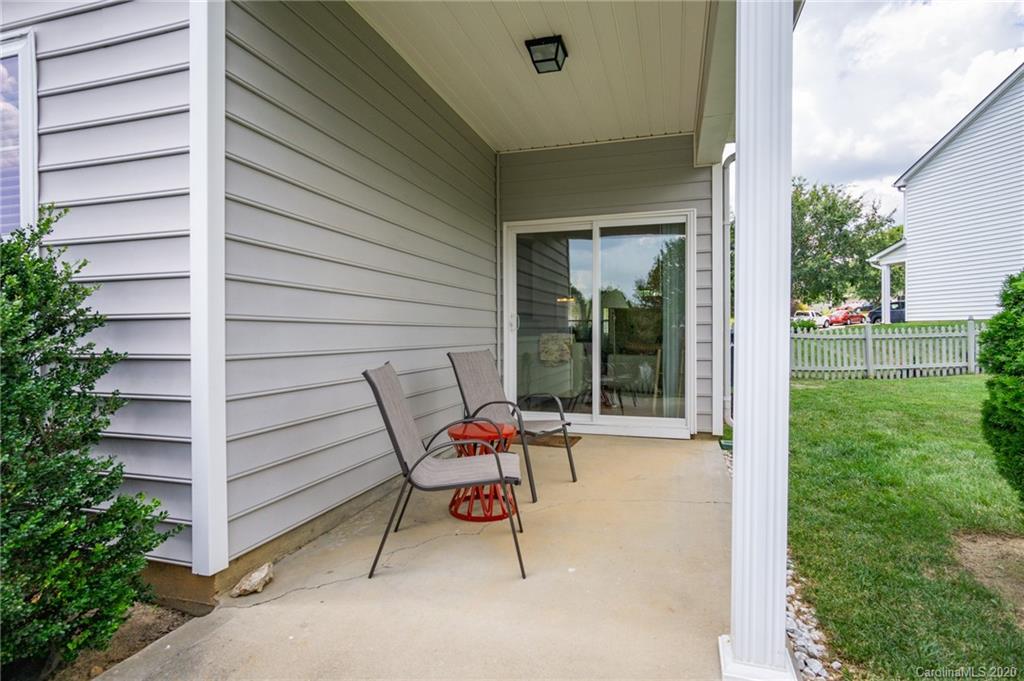 3143 Tanzanite Circle Fort Mill, SC 29708 - Photo 23 of 33 a backyard with a bench and garden