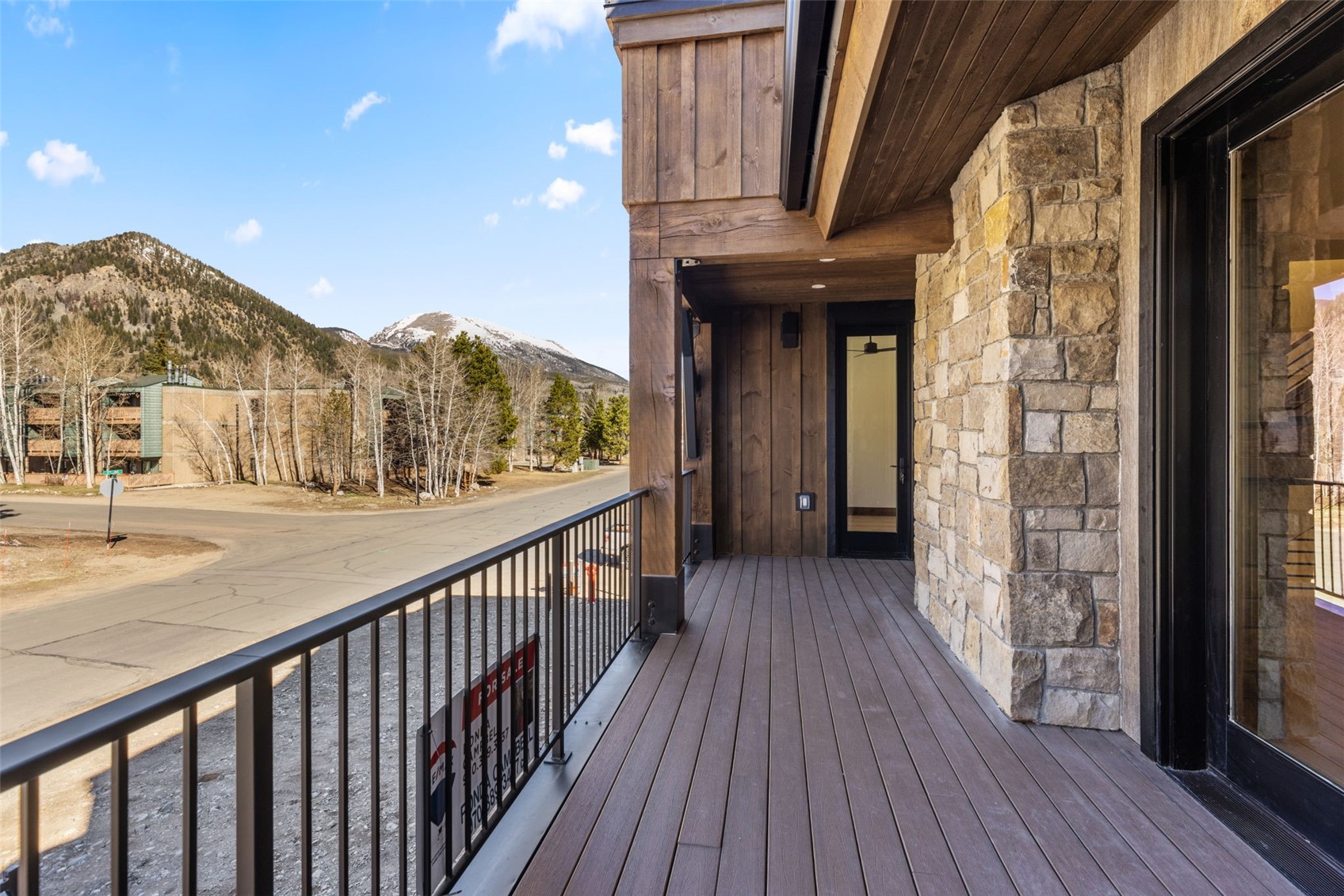 308 3rd Avenue Frisco, CO 80443 - Photo 15 of 45 a view of a balcony with wooden floor and fence