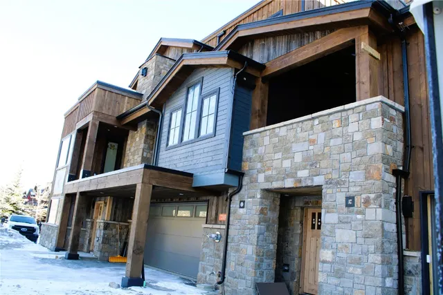 a view of a house with a street