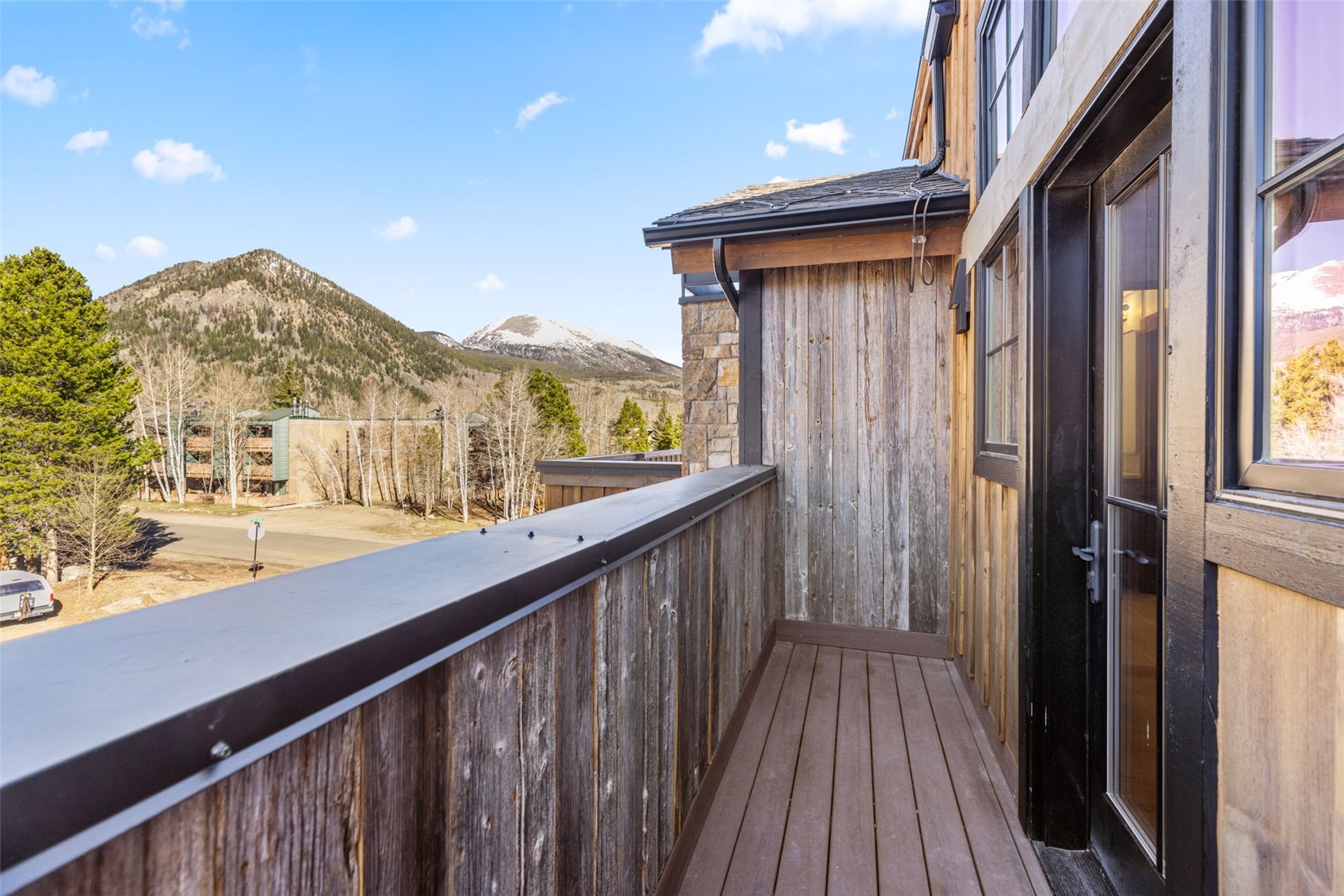 308 3rd Avenue Frisco, CO 80443 - Photo 23 of 45 a view of a balcony with furniture and wooden floor