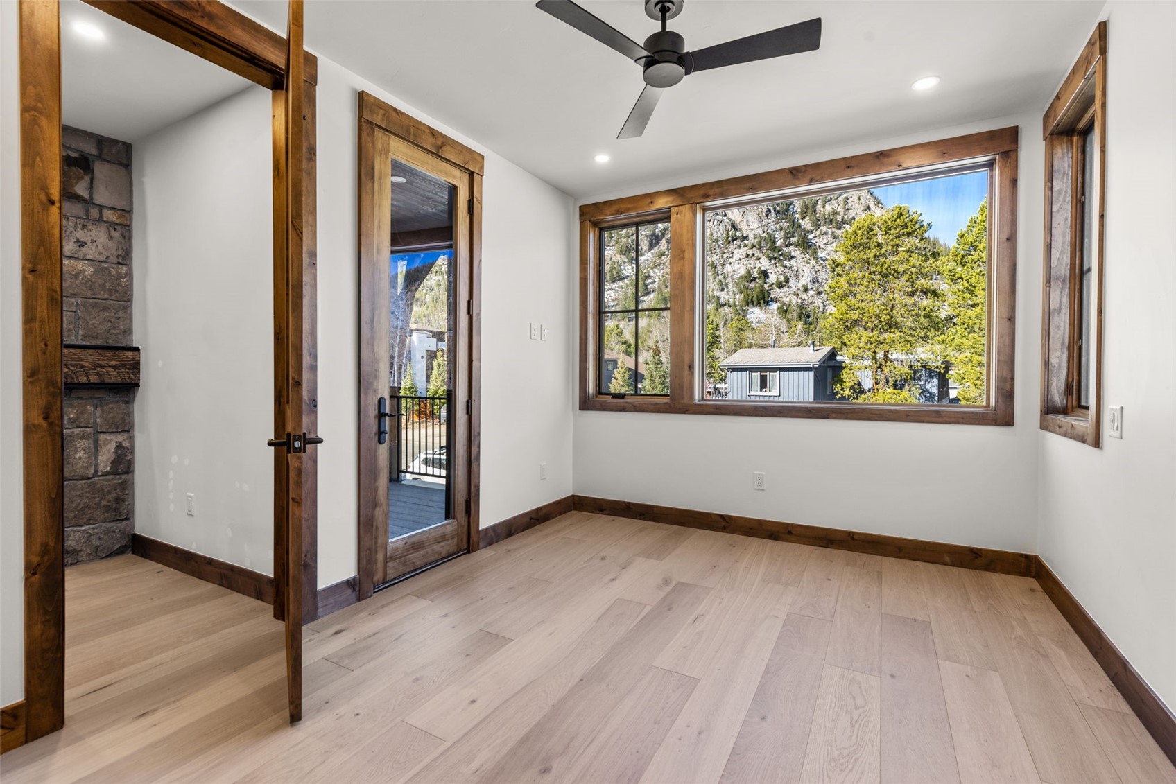 308 3rd Avenue Frisco, CO 80443 - Photo 28 of 45 a view of an empty room with wooden floor and a window