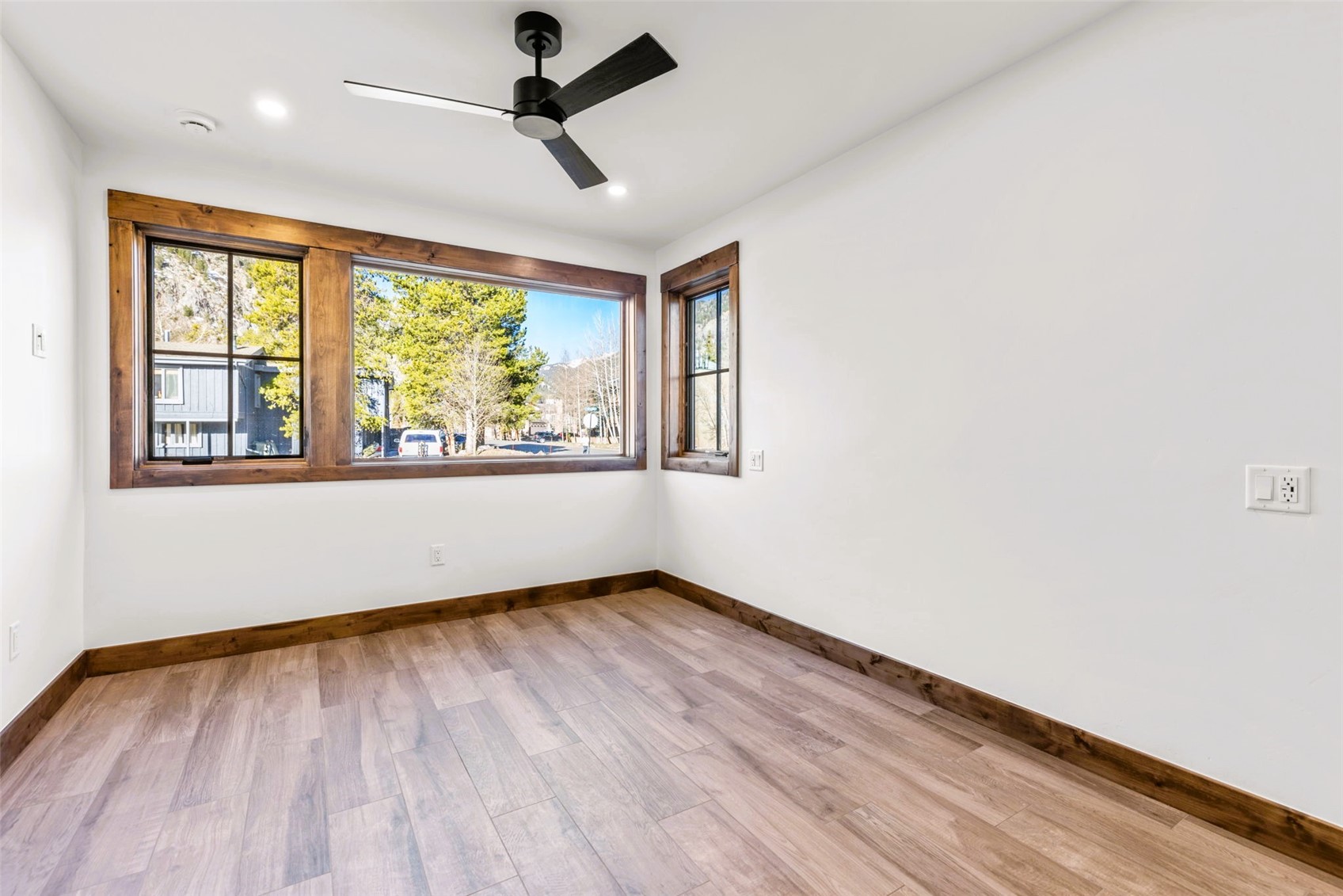 308 3rd Avenue Frisco, CO 80443 - Photo 32 of 45 wooden floor in an empty room with a window