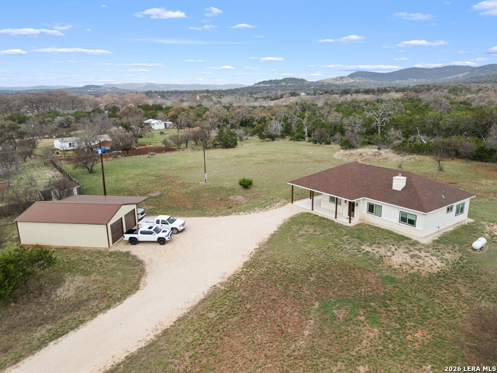 a view of a street with a yard