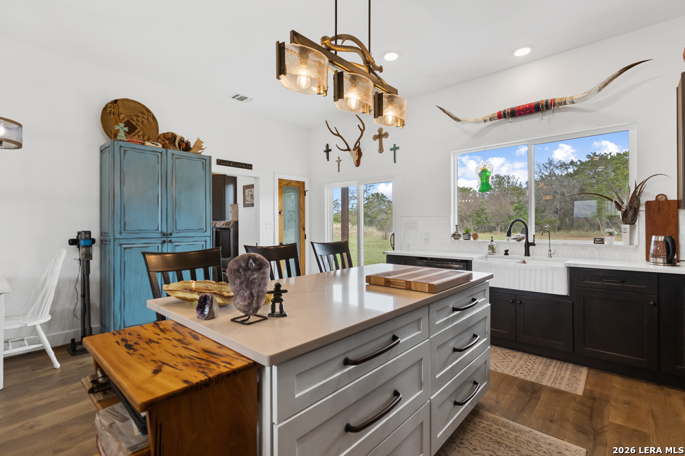 175 Pine Tree Road Medina, TX 78055 - Photo 19 of 34 a kitchen with a sink and cabinets