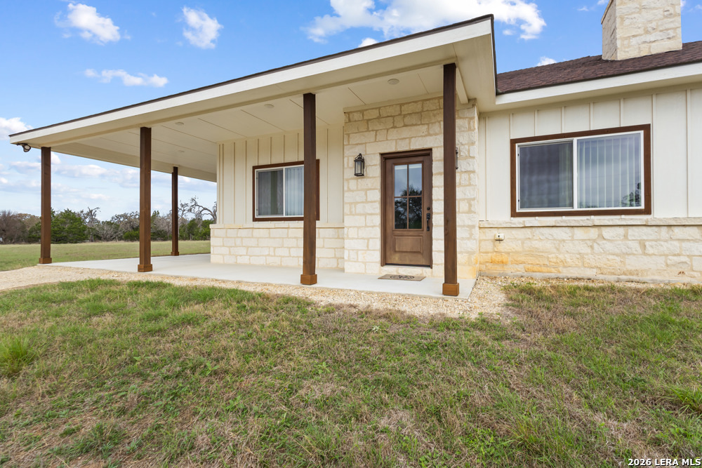 175 Pine Tree Road Medina, TX 78055 - Photo 5 of 34 a house view with a garden space
