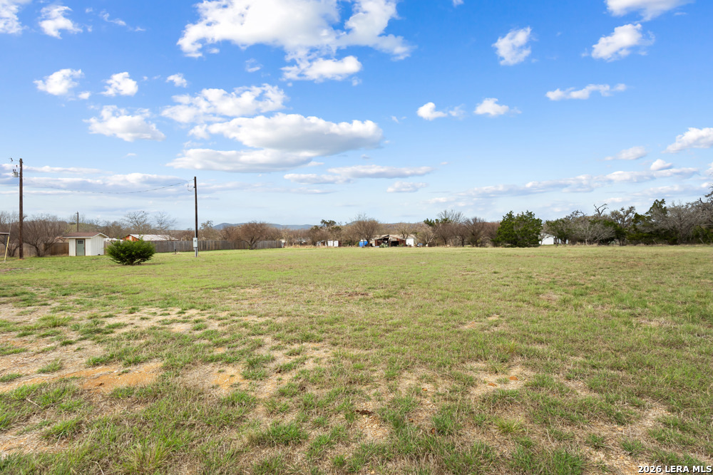175 Pine Tree Road Medina, TX 78055 - Photo 10 of 34 a view of a lake with houses in the back