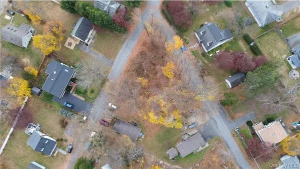 an aerial view of waterside residential houses with outdoor space