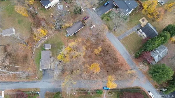 an aerial view of a house with outdoor space