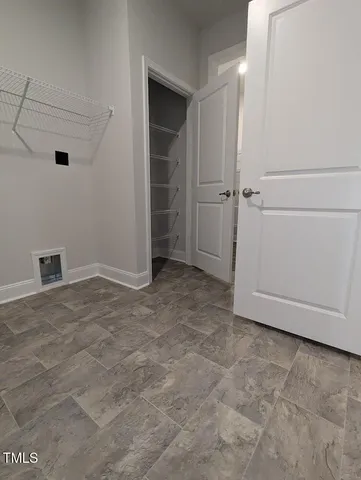 an empty room with closet