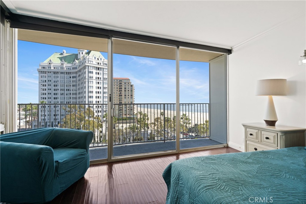 700 East Ocean Boulevard, Unit 1104 Long Beach, CA 90802 - Photo 17 of 47 a bedroom with a bed and a night stand