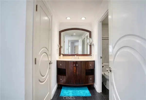a view of a hallway with washer and dryer