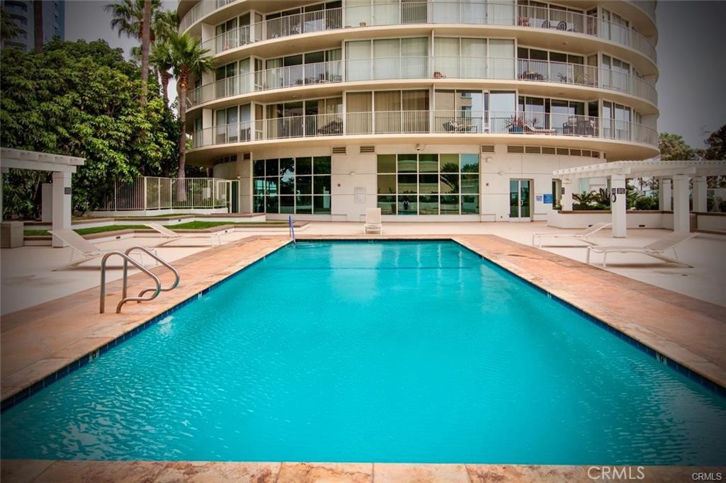 700 East Ocean Boulevard, Unit 1104 Long Beach, CA 90802 - Photo 33 of 47 a view of a swimming pool with outdoor seating