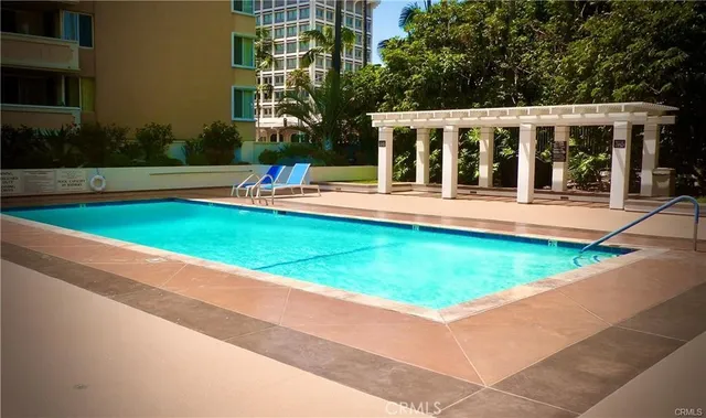 a view of house with yard and porch