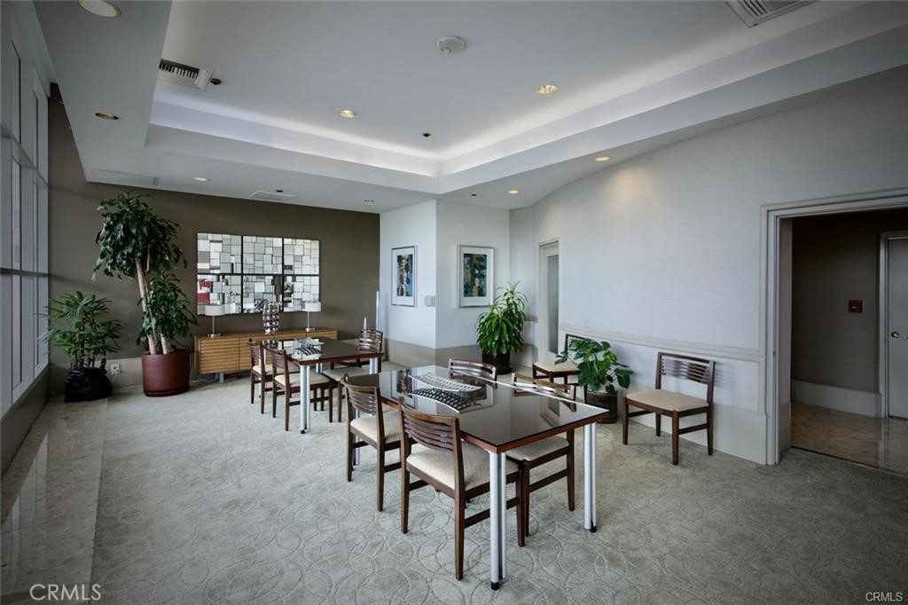 700 East Ocean Boulevard, Unit 1104 Long Beach, CA 90802 - Photo 41 of 47 a living room with furniture and a potted plant