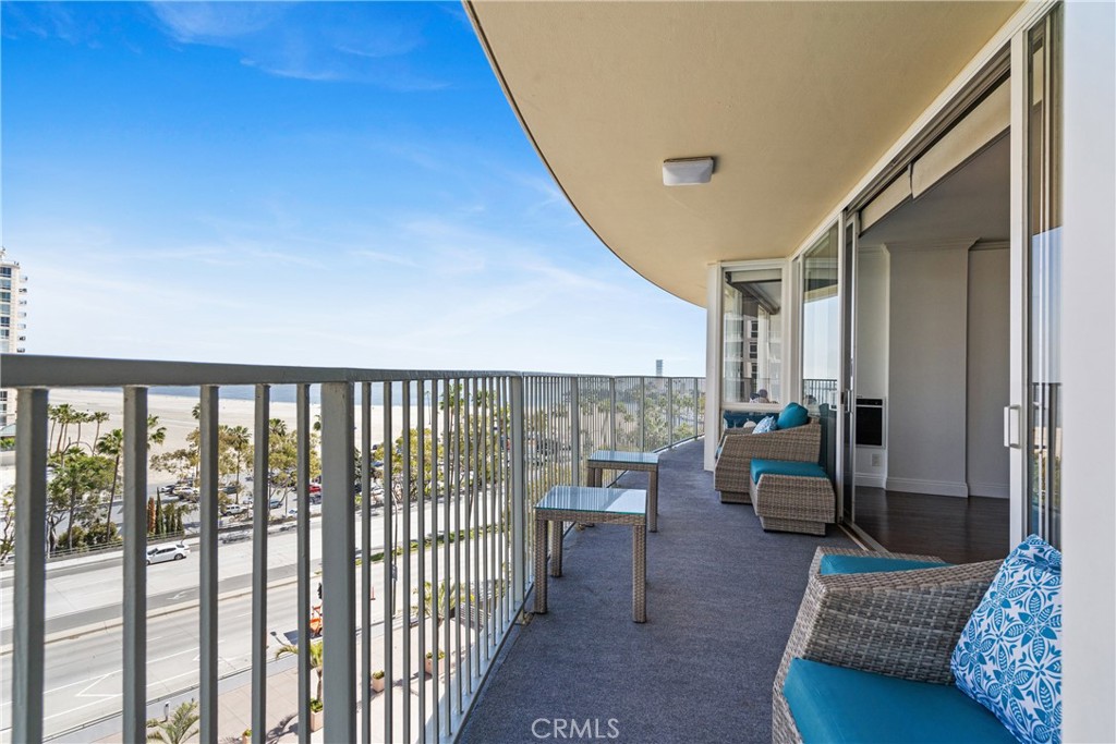 700 East Ocean Boulevard, Unit 1104 Long Beach, CA 90802 - Photo 6 of 47 a living room with furniture and a floor to ceiling window