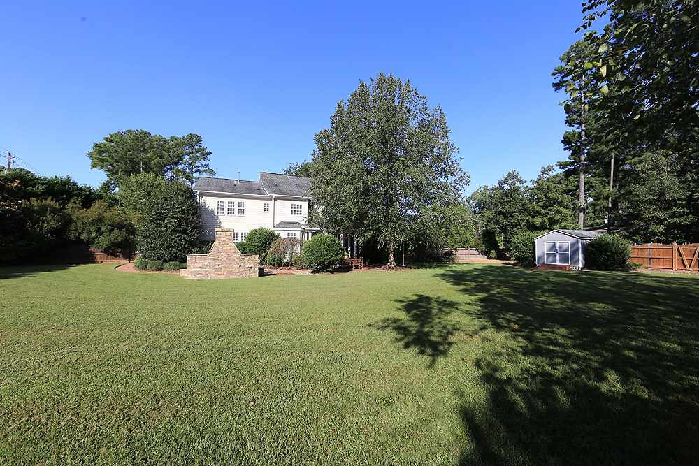 1721 Bayleaf Trail Raleigh, NC 27614 - Photo 3 of 30 .93 of an acre to enjoy. Nice flat yard that has even more possibilities! Exterior Back