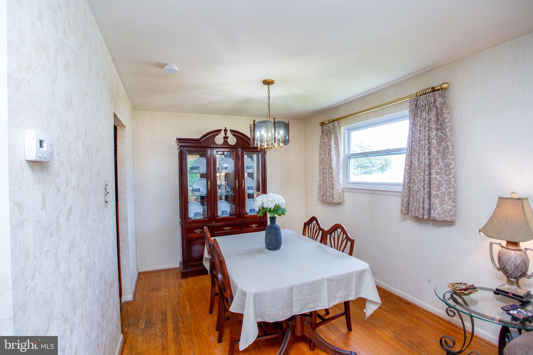 1264 Tulip Road Warminster, PA 18974 - Photo 6 of 21 a view of a dining room with furniture and window