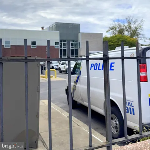 a view of a street with seating space