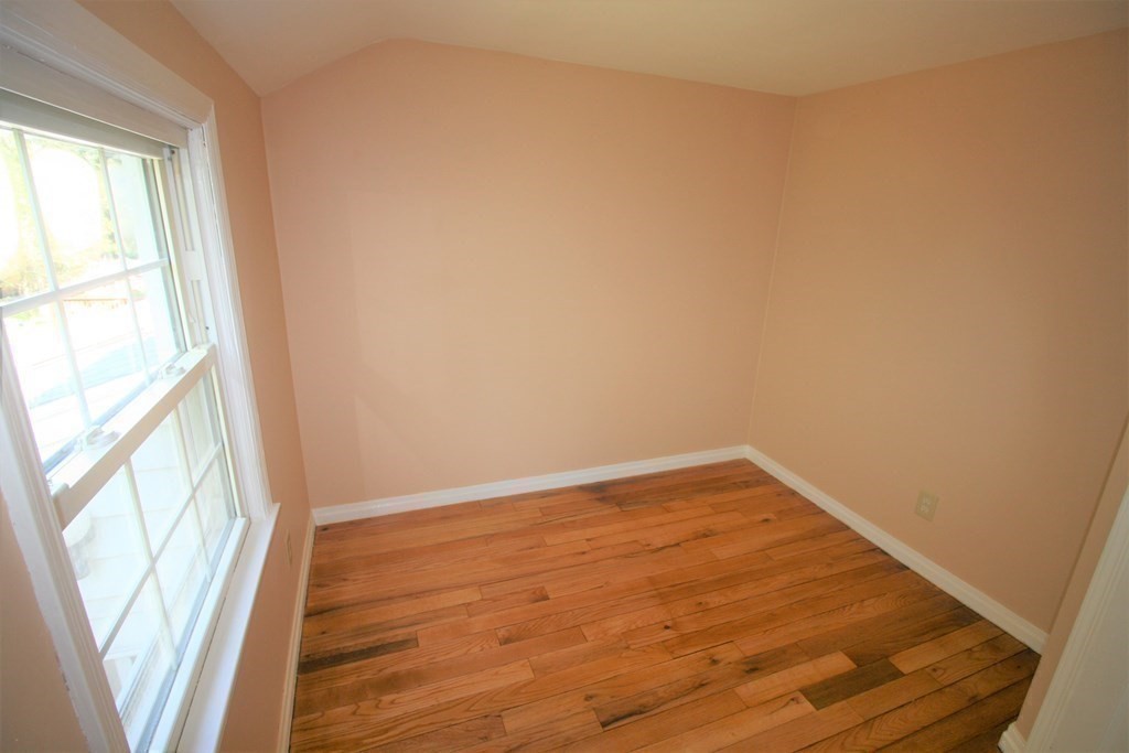 116 Donbray Road Springfield, MA 01119 - Photo 13 of 42 a view of empty room with wooden floor and fan