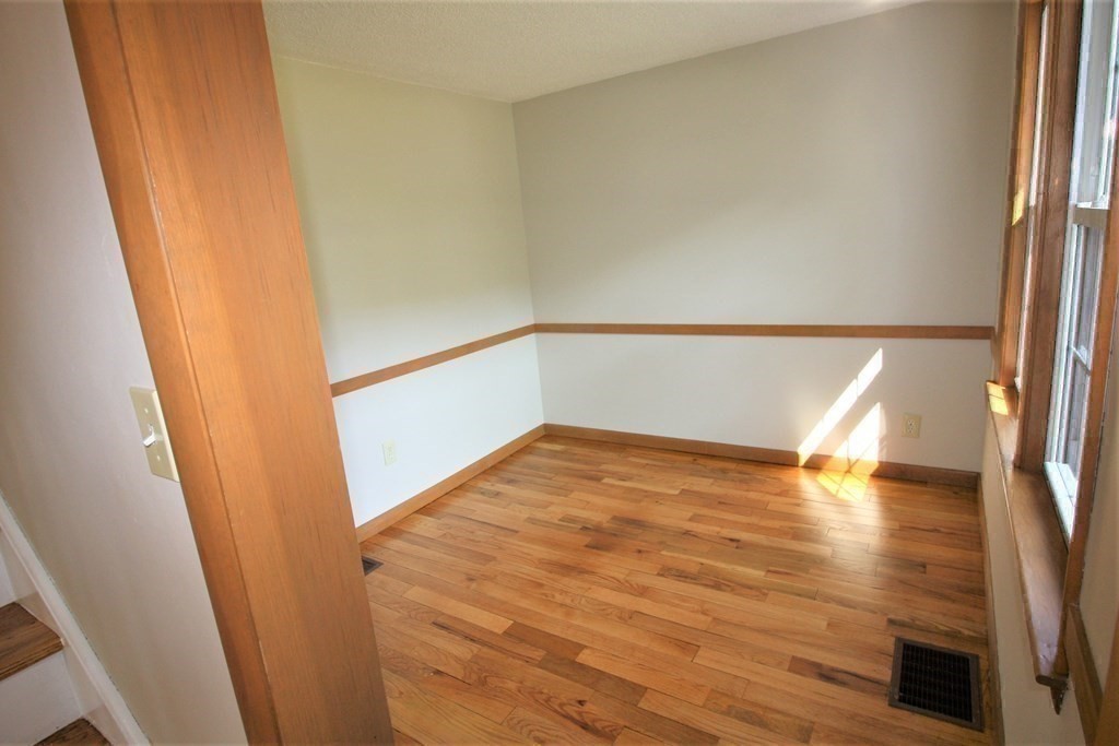 116 Donbray Road Springfield, MA 01119 - Photo 21 of 42 a view of an empty room with wooden floor