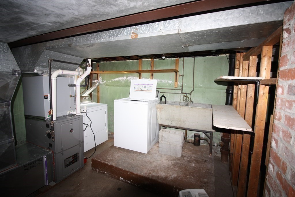 116 Donbray Road Springfield, MA 01119 - Photo 36 of 42 a utility room with dryer and washer