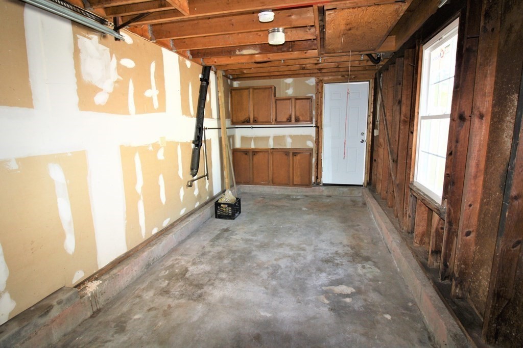 116 Donbray Road Springfield, MA 01119 - Photo 39 of 42 a view of a hallway with a kitchen