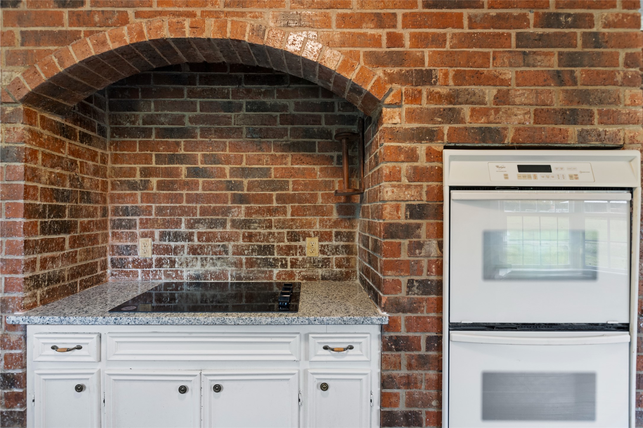 27093 Frye Road Splendora, TX 77372 - Photo 22 of 32 a close view of a sink a stove a faucet a washer and dryer