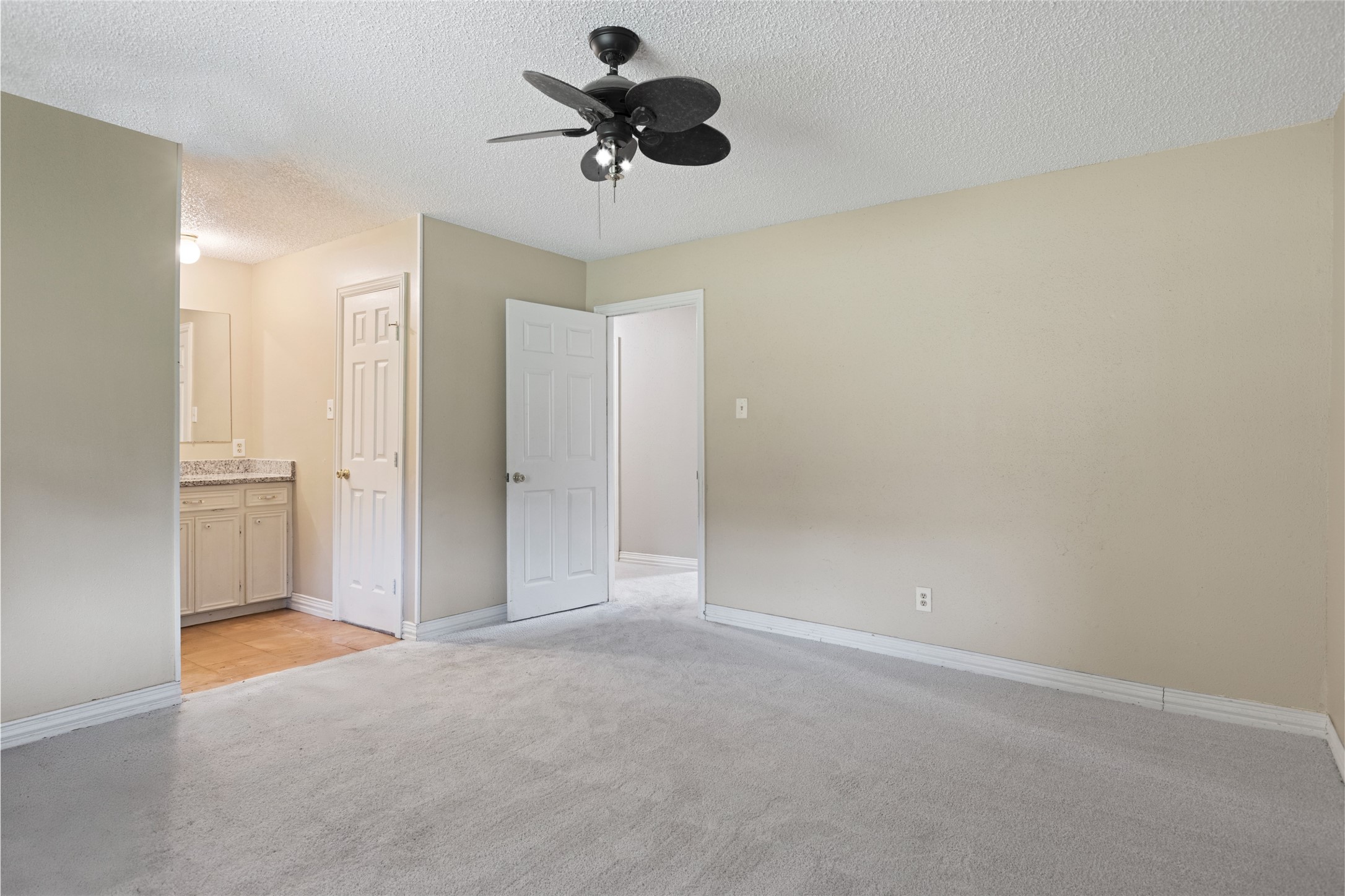 27093 Frye Road Splendora, TX 77372 - Photo 28 of 32 a view of an empty room and chandelier fan