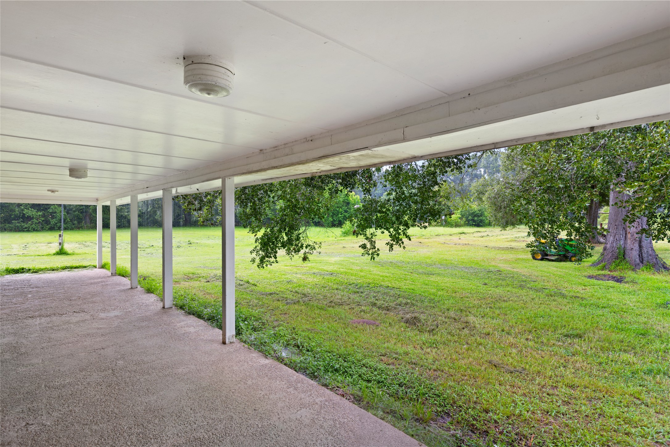 27093 Frye Road Splendora, TX 77372 - Photo 31 of 32 a view of a backyard with a garden and plants